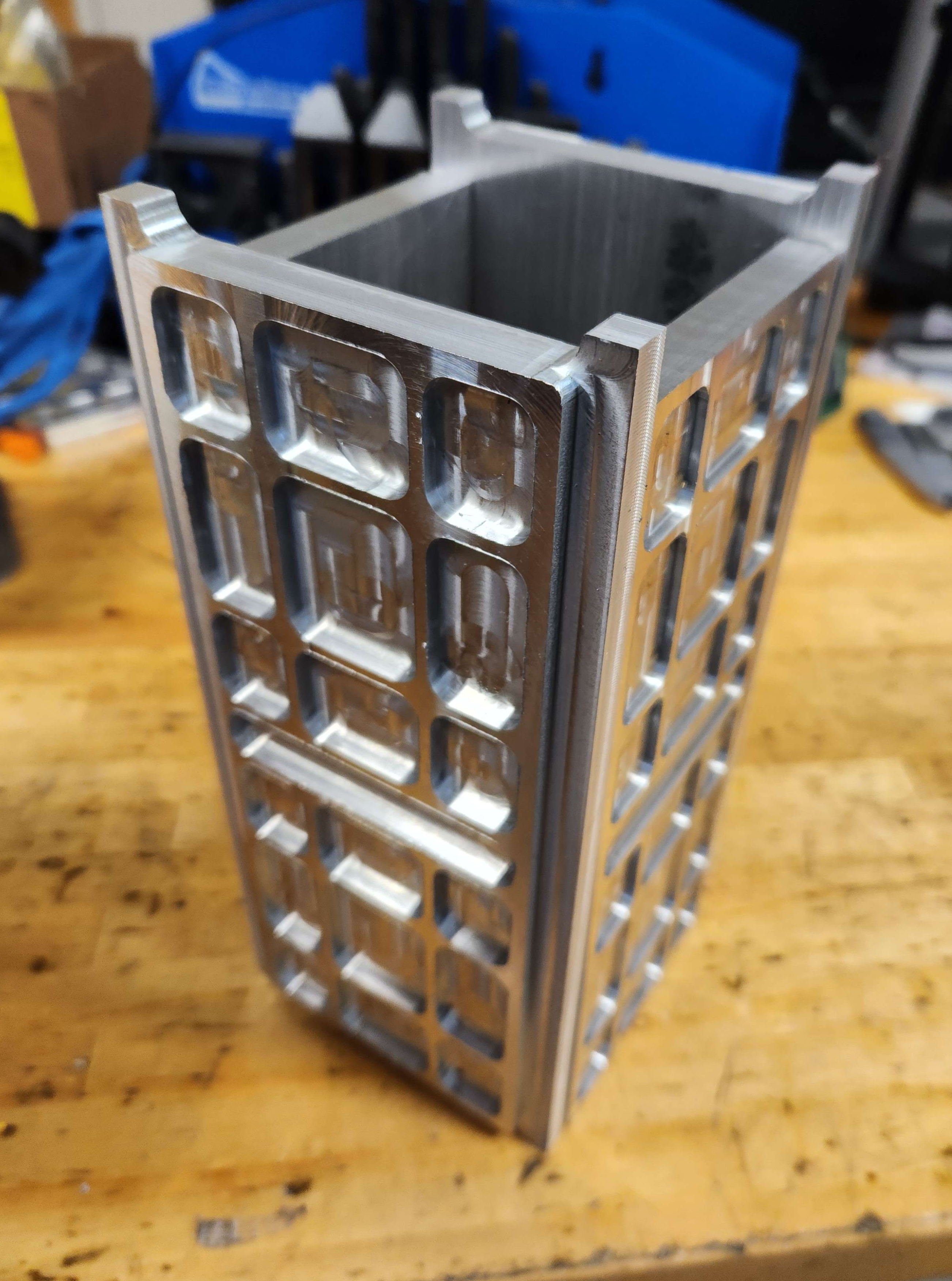CNC machined aluminum CubeSat demo model frame showing precision engineering and modular design